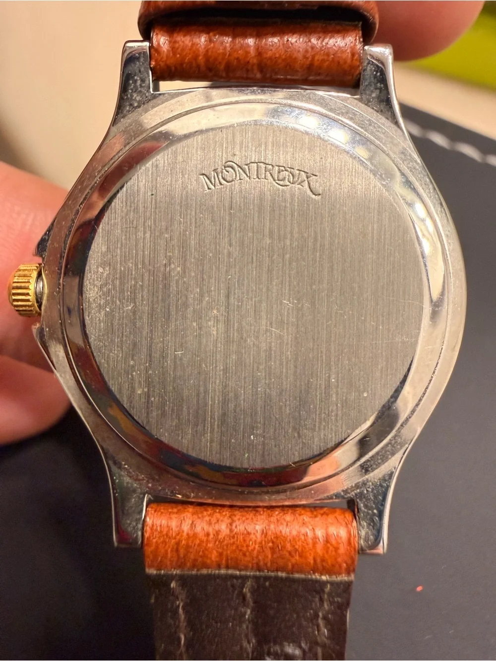 Brown Leather-Strap Watch with Gold-Bezel Accent need battery